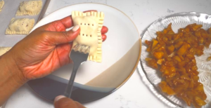 use the fork to poke some holes to release the air