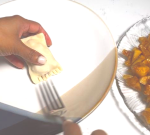 use the fork to press around the edges