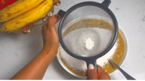 sift in flour and baking soda