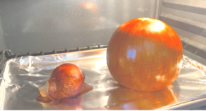remove the onion first, than continue baking the pumpkin until it's done