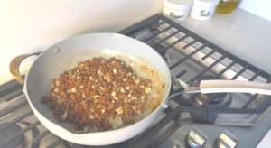 add chopped onions, chopped garlic