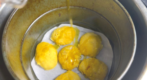 put frozen chicken nuggets on the parchment paper and drizzle some olive oil