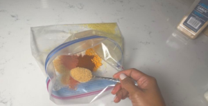 put all seasoning into ziplock bag