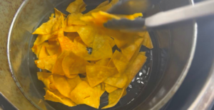 Stir the chips after cooking half way