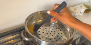 brush some oil at the bottom of steamer pot