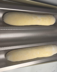 2 baguette are proofing before bake