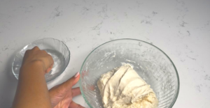 dip your hand in the water each time you fold the dough to prevent from sticking