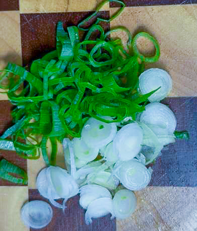 top with chopped green onions
